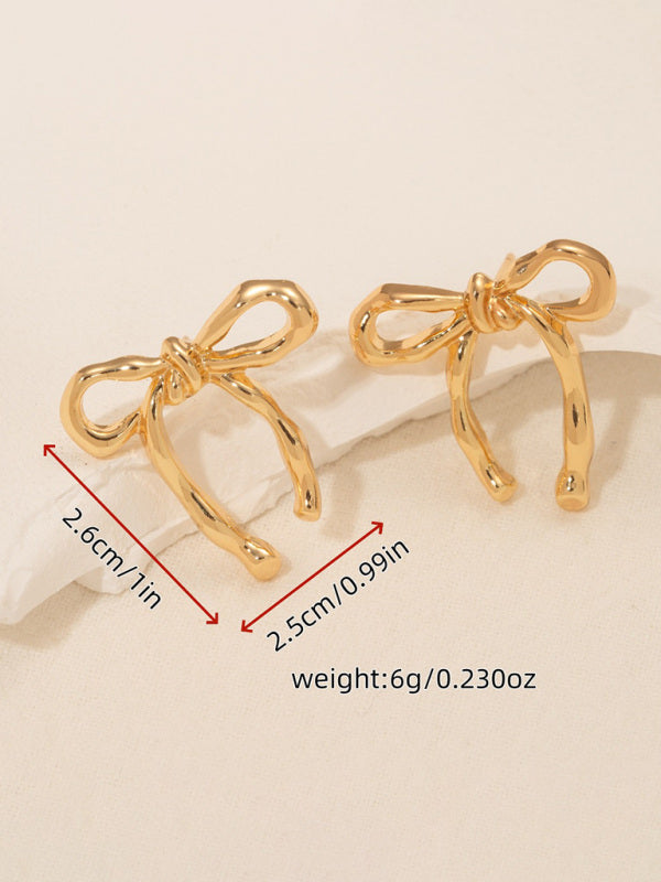 Gold bow earrings, simple and stylish glossy earrings