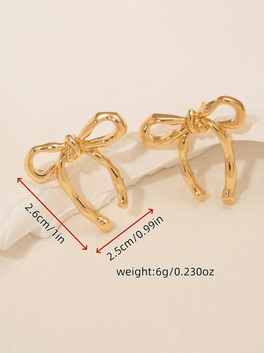 Gold bow earrings, simple and stylish glossy earrings