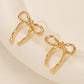 Gold bow earrings, simple and stylish glossy earrings