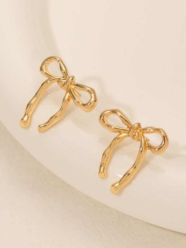 Gold bow earrings, simple and stylish glossy earrings